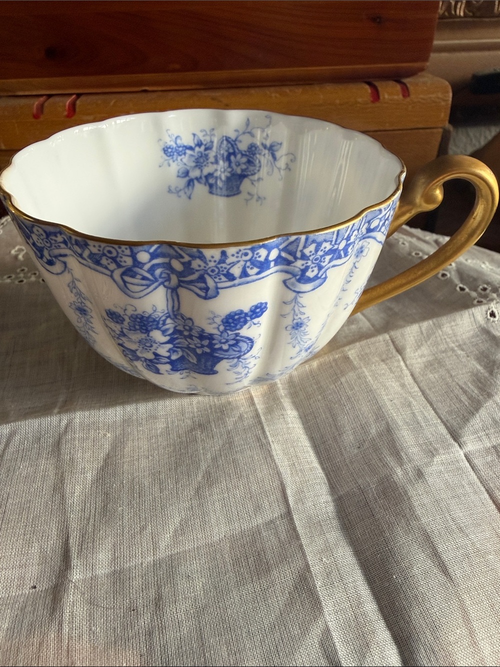 Blue Floral Porcelain Teacup with Gold Handle